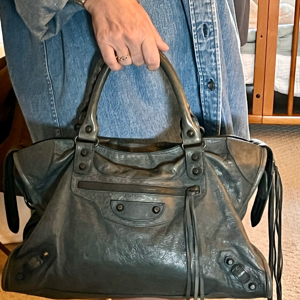 Arena tote measurements w. 11.7, H 8.2, D3.9
